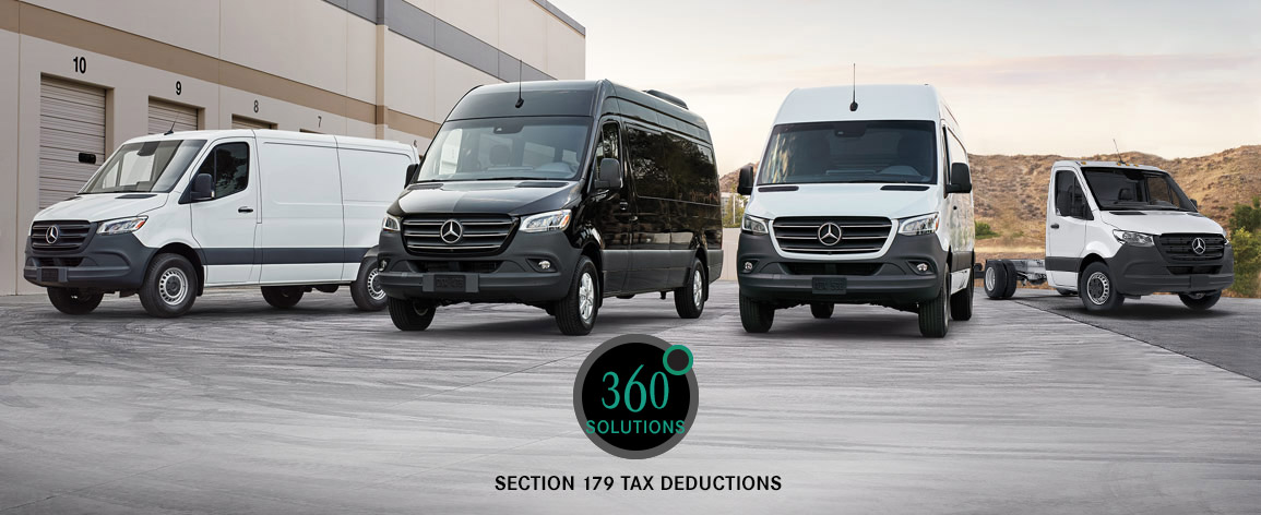 Photo of four different Mercedes-Benz van models parked at a business center.