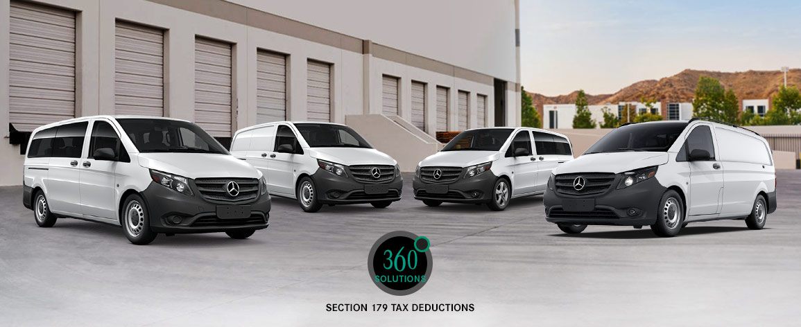 Two different models of Metris vans.